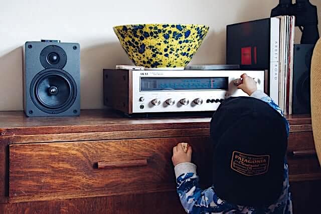 Child-with-receiver Child tuning a receiver